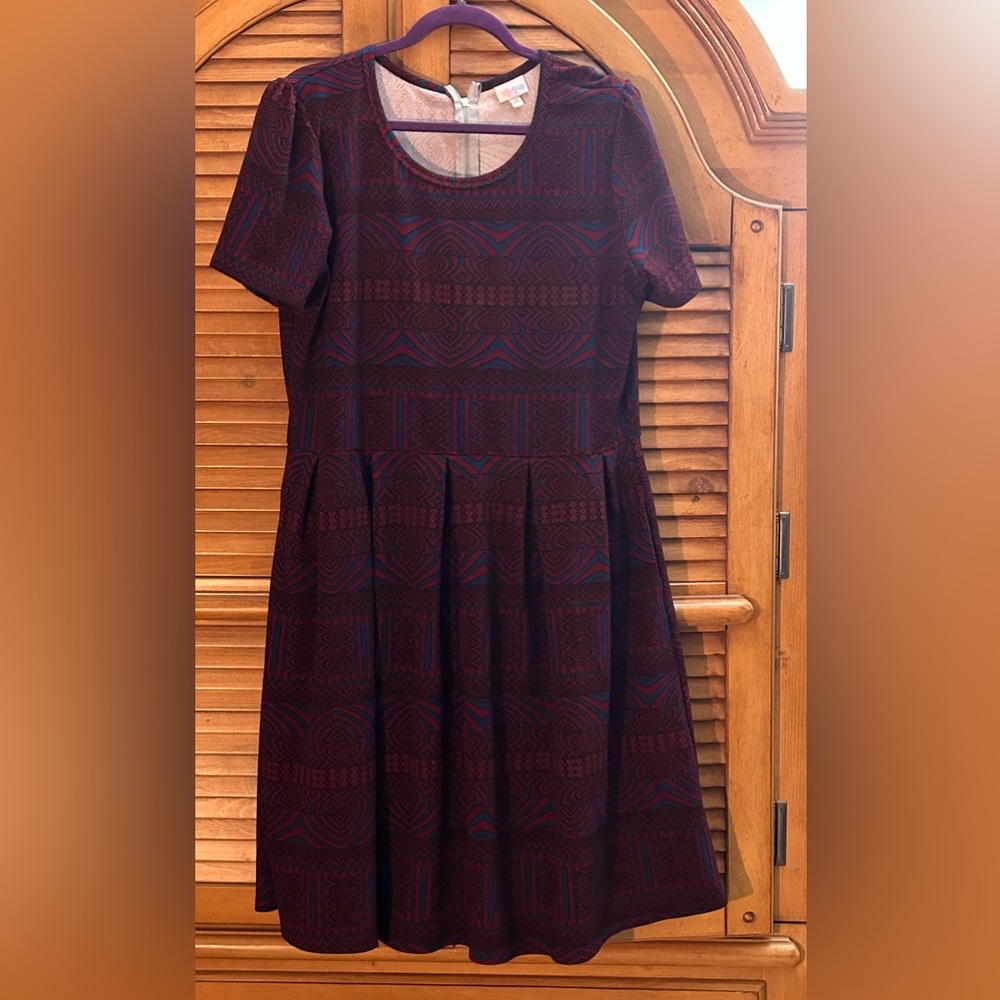 Maroon and blue lined dress.
